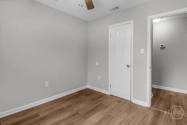 213 Executive Park Dr, Savannah, GA 31406 - unfurnished bedroom with wood finished floors and a ceiling fan