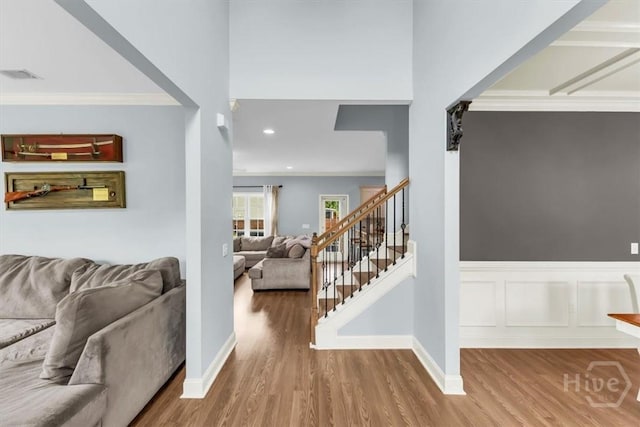 291 Kerry Dr, Richmond Hill, GA 31324 - foyer entrance featuring crown molding, wood finished floors, stairs, and recessed lighting