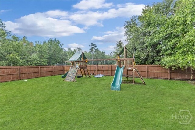 291 Kerry Dr, Richmond Hill, GA 31324 - view of playground with a fenced backyard