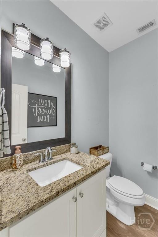 291 Kerry Dr, Richmond Hill, GA 31324 - bathroom featuring vanity and wood finished floors