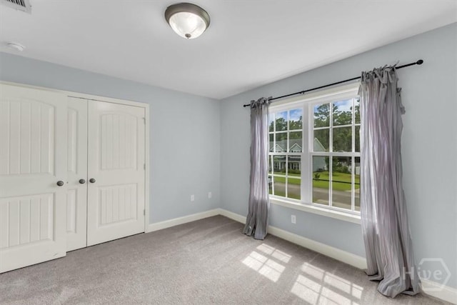 291 Kerry Dr, Richmond Hill, GA 31324 - unfurnished bedroom with carpet and a closet