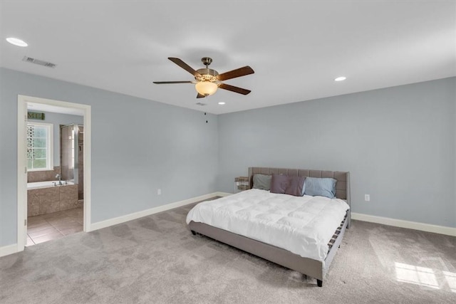 291 Kerry Dr, Richmond Hill, GA 31324 - carpeted bedroom featuring recessed lighting, a ceiling fan, and connected bathroom