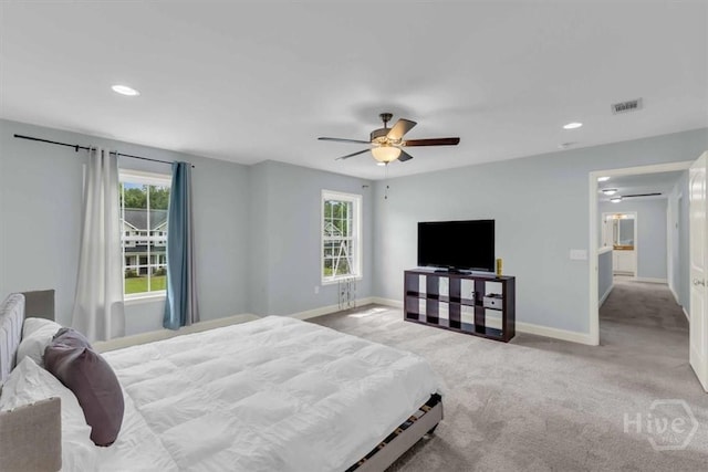 291 Kerry Dr, Richmond Hill, GA 31324 - carpeted bedroom featuring multiple windows, recessed lighting, and a ceiling fan