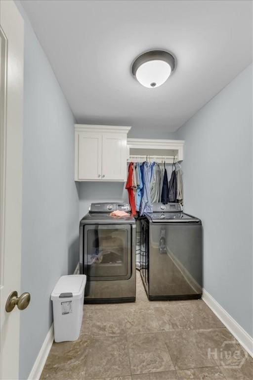 291 Kerry Dr, Richmond Hill, GA 31324 - laundry room with washer and clothes dryer and cabinet space