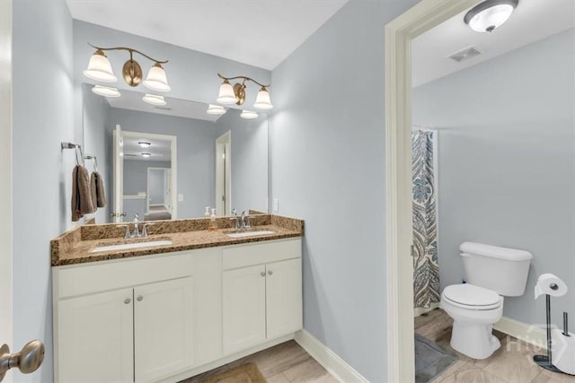 291 Kerry Dr, Richmond Hill, GA 31324 - full bath featuring toilet and double vanity