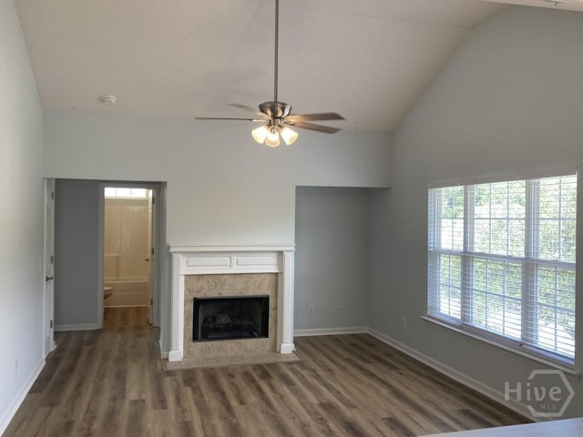 129 Ridgewood Cir, Rincon, GA 31326 - unfurnished living room with wood finished floors, a premium fireplace, high vaulted ceiling, and ceiling fan