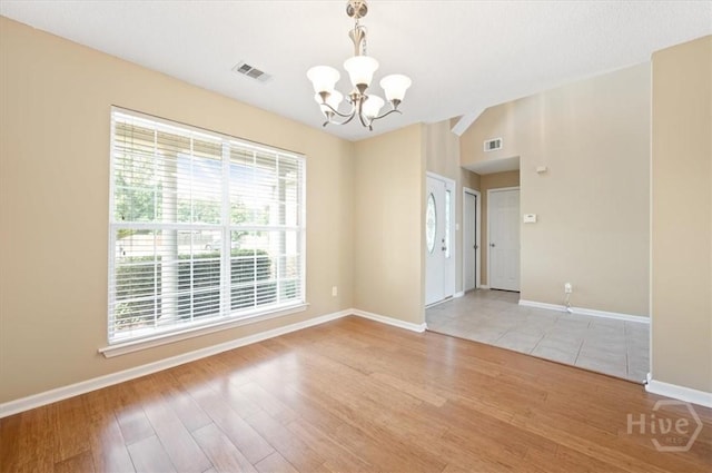 10 Cassidy Ct, Pooler, GA 31322 - unfurnished room with a chandelier and light wood-type flooring