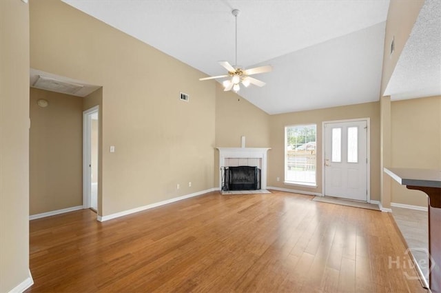 10 Cassidy Ct, Pooler, GA 31322 - unfurnished living room with light wood finished floors, a fireplace, ceiling fan, and high vaulted ceiling