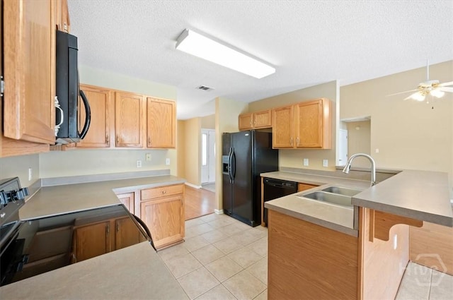 10 Cassidy Ct, Pooler, GA 31322 - kitchen with black appliances, a peninsula, light tile patterned floors, a textured ceiling, and a ceiling fan