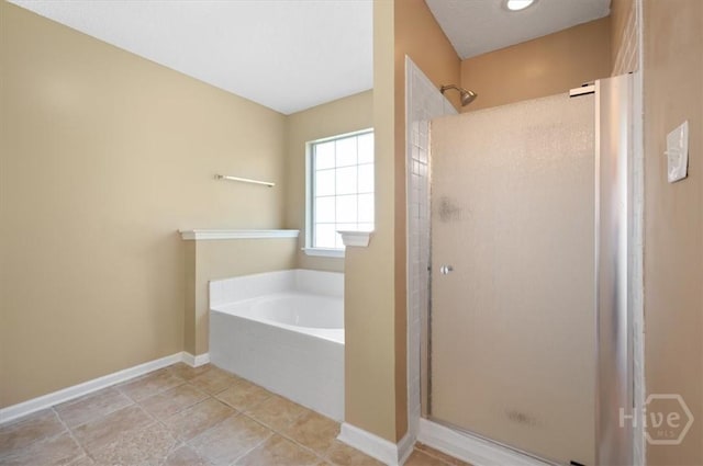 10 Cassidy Ct, Pooler, GA 31322 - bathroom featuring a stall shower, a garden tub, and tile patterned flooring