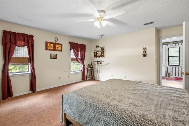 675 Foxwood Cir, Jesup, GA 31545 - bedroom with carpet, a textured ceiling, and ceiling fan