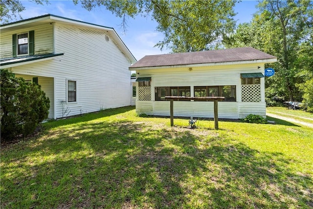 675 Foxwood Cir, Jesup, GA 31545 - view of home's exterior featuring a lawn