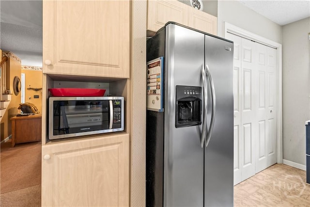 675 Foxwood Cir, Jesup, GA 31545 - kitchen featuring appliances with stainless steel finishes and light brown cabinets