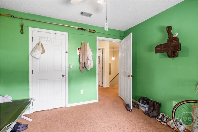 675 Foxwood Cir, Jesup, GA 31545 - carpeted bedroom with a ceiling fan and baseboards