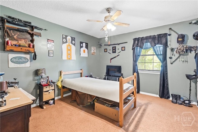 675 Foxwood Cir, Jesup, GA 31545 - bedroom featuring light colored carpet, an office area, a textured ceiling, and a ceiling fan
