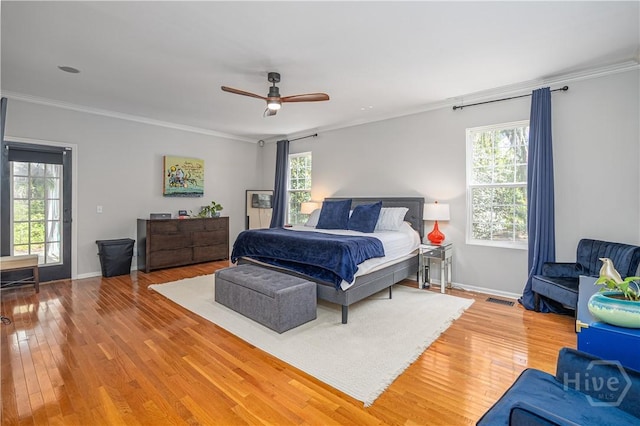 8720 Ferguson Ave, Savannah, GA 31406 - bedroom featuring ornamental molding, wood finished floors, and ceiling fan