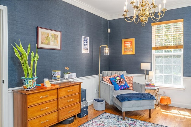 8720 Ferguson Ave, Savannah, GA 31406 - sitting room with wood finished floors, a chandelier, wainscoting, and ornamental molding