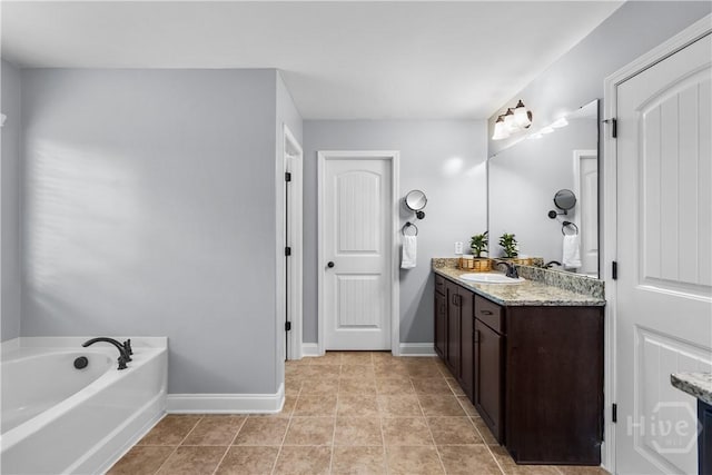 85 Wicklow Dr, Richmond Hill, GA 31324 - full bathroom featuring vanity, a bath, and tile patterned flooring