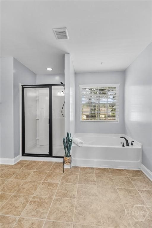 85 Wicklow Dr, Richmond Hill, GA 31324 - bathroom with a garden tub and a shower stall