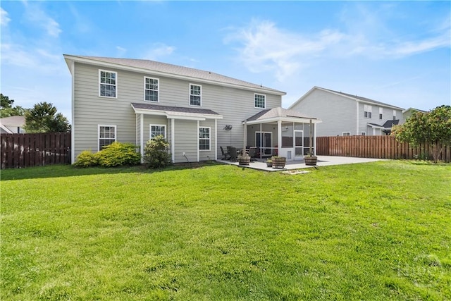 85 Wicklow Dr, Richmond Hill, GA 31324 - back of property with a sunroom, a patio area, and a fenced backyard