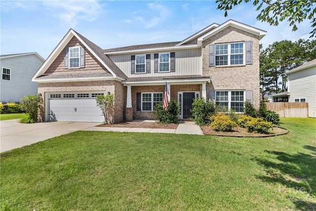 85 Wicklow Dr, Richmond Hill, GA 31324 - craftsman house featuring a garage, driveway, board and batten siding, and brick siding