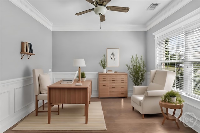 85 Wicklow Dr, Richmond Hill, GA 31324 - office area with wood finished floors, wainscoting, crown molding, a ceiling fan, and a decorative wall
