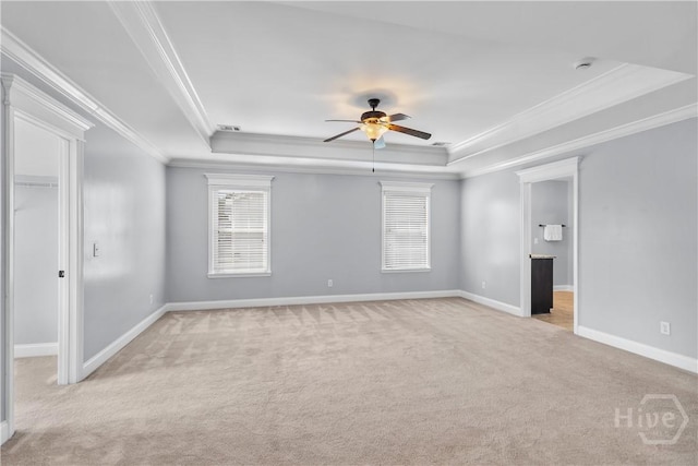 85 Wicklow Dr, Richmond Hill, GA 31324 - unfurnished room featuring a raised ceiling, crown molding, a ceiling fan, light carpet, and healthy amount of natural light
