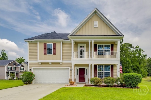 353 Casey Dr, Pooler, GA 31322 - view of front of home with a balcony, board and batten siding, a front lawn, concrete driveway, and a garage