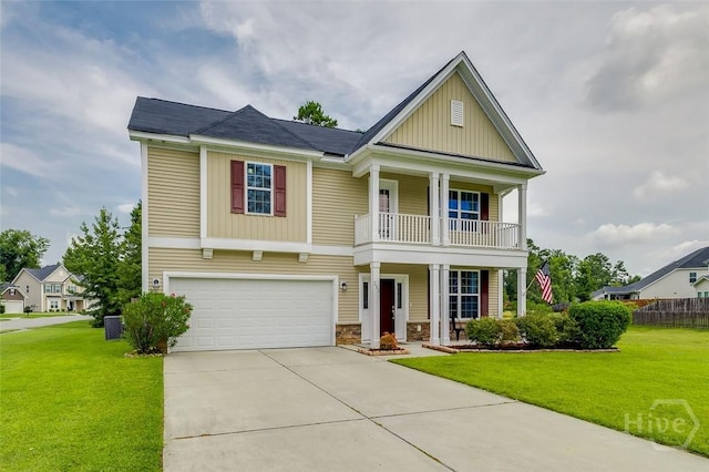 353 Casey Dr, Pooler, GA 31322 - view of front of home featuring a balcony, board and batten siding, driveway, an attached garage, and covered porch