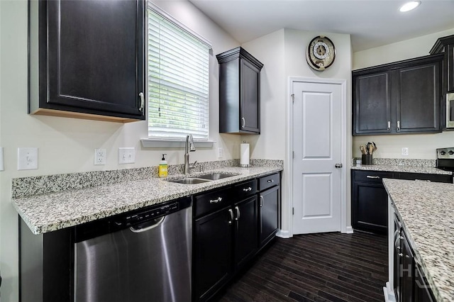 353 Casey Dr, Pooler, GA 31322 - kitchen featuring stainless steel appliances, dark wood-style floors, dark cabinets, recessed lighting, and light stone counters