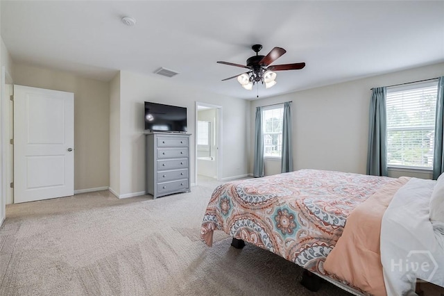 353 Casey Dr, Pooler, GA 31322 - bedroom featuring light colored carpet, ceiling fan, and ensuite bath