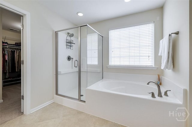 353 Casey Dr, Pooler, GA 31322 - full bath featuring a stall shower, a garden tub, and a spacious closet