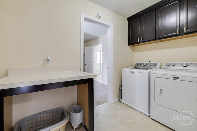 353 Casey Dr, Pooler, GA 31322 - laundry area featuring washing machine and clothes dryer, cabinet space, light tile patterned floors, and light colored carpet