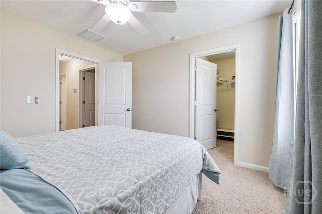 353 Casey Dr, Pooler, GA 31322 - bedroom featuring light colored carpet, a spacious closet, and a ceiling fan