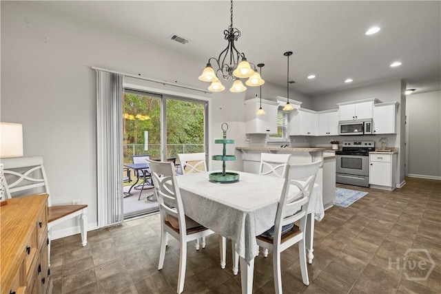 130 Whirlwind Way, Guyton, GA 31312 - dining space with a chandelier and recessed lighting
