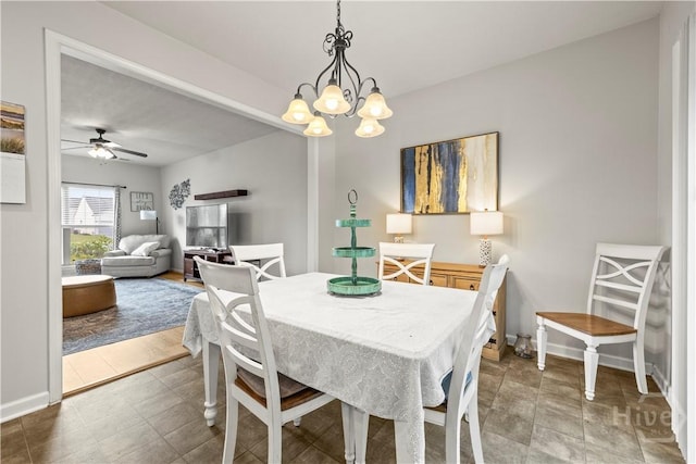 130 Whirlwind Way, Guyton, GA 31312 - dining room featuring a chandelier and a ceiling fan