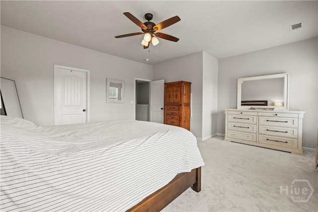 130 Whirlwind Way, Guyton, GA 31312 - bedroom with light colored carpet and a ceiling fan