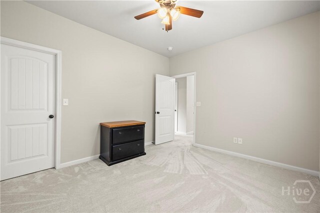 130 Whirlwind Way, Guyton, GA 31312 - unfurnished bedroom with light colored carpet and ceiling fan