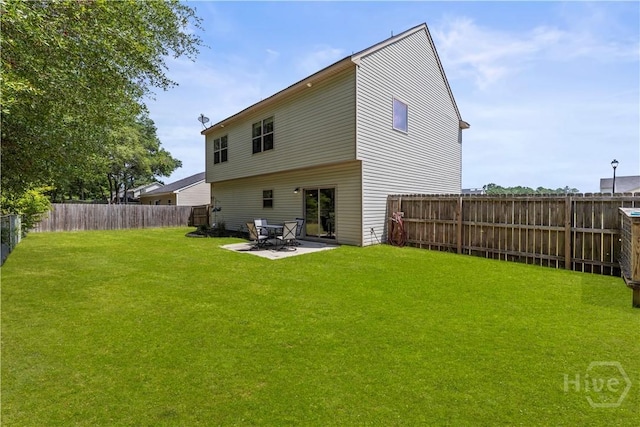 130 Whirlwind Way, Guyton, GA 31312 - back of property featuring a fenced backyard and a patio