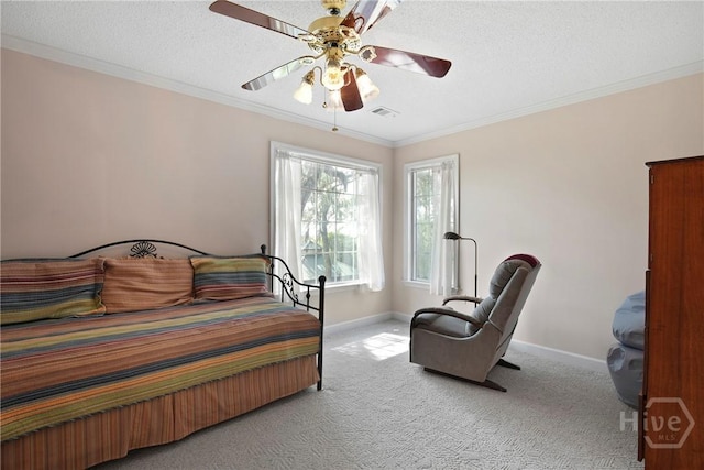 245 Youmans Rd, Midway, GA 31320 - carpeted bedroom featuring ornamental molding, a ceiling fan, and a textured ceiling