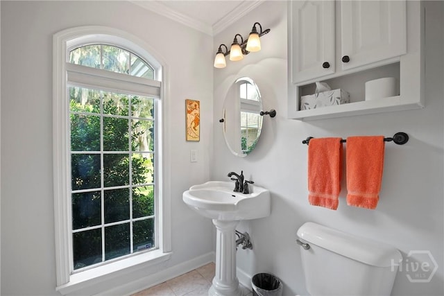 245 Youmans Rd, Midway, GA 31320 - bathroom with ornamental molding, plenty of natural light, and tile patterned floors