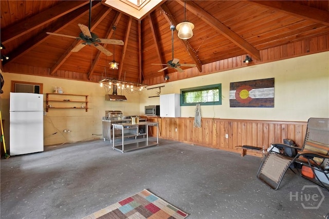 245 Youmans Rd, Midway, GA 31320 - misc room with a ceiling fan, a wainscoted wall, a wooden ceiling with exposed beams, a skylight, and high vaulted ceiling