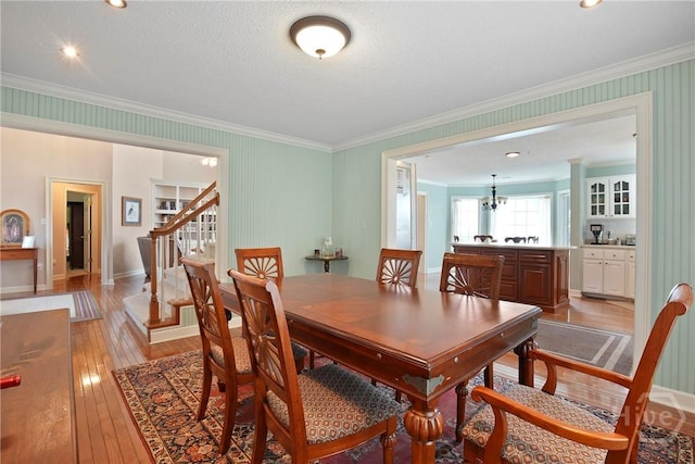 245 Youmans Rd, Midway, GA 31320 - dining room with ornamental molding, light wood-style flooring, stairway, a chandelier, and recessed lighting