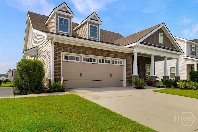 131 Como Dr, Pooler, GA 31322 - view of front of property featuring a front yard, concrete driveway, an attached garage, a porch, and roof with shingles