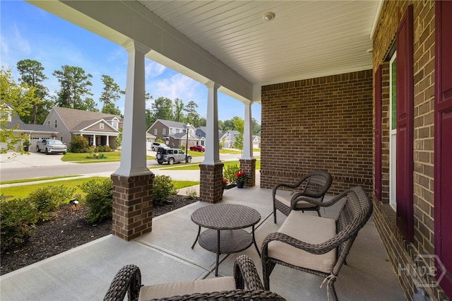 131 Como Dr, Pooler, GA 31322 - covered porch featuring a residential view