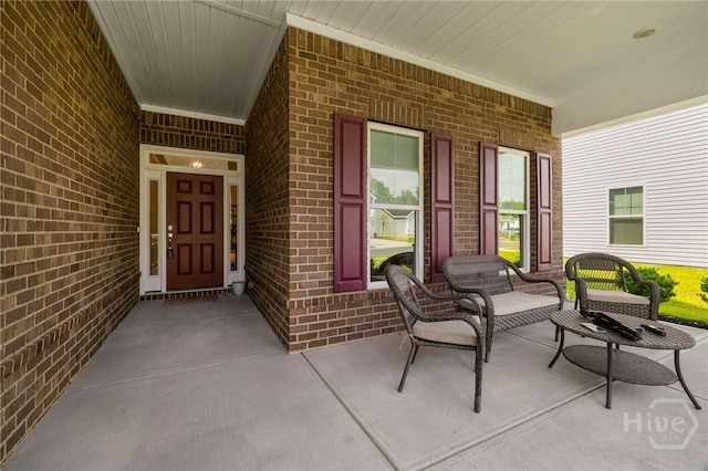 131 Como Dr, Pooler, GA 31322 - property entrance featuring a porch and brick siding