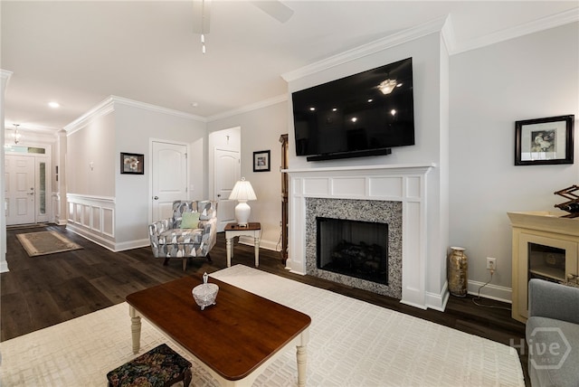 131 Como Dr, Pooler, GA 31322 - living room with a fireplace, dark wood-type flooring, crown molding, recessed lighting, and a ceiling fan