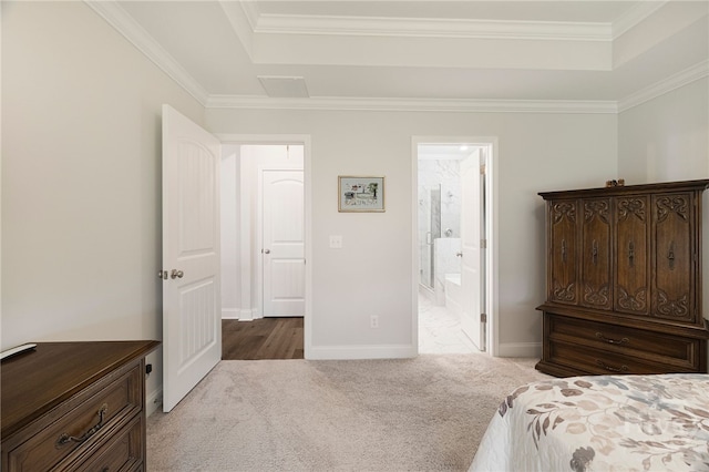 131 Como Dr, Pooler, GA 31322 - carpeted bedroom featuring a tray ceiling, attic access, crown molding, and ensuite bath