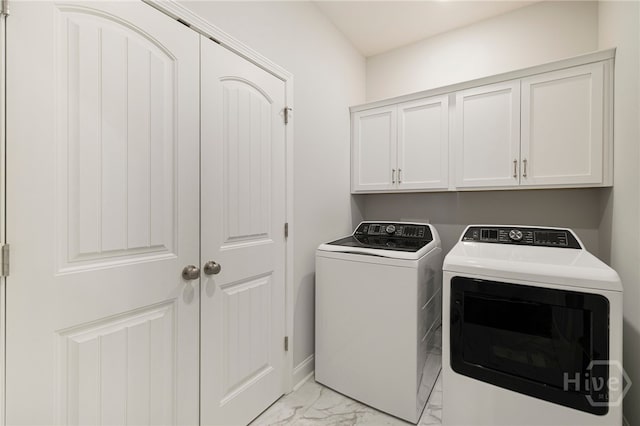 131 Como Dr, Pooler, GA 31322 - laundry area featuring light marble finish flooring, washing machine and clothes dryer, and cabinet space