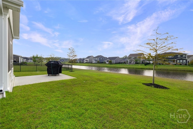 131 Como Dr, Pooler, GA 31322 - view of yard featuring a patio area, a residential view, and a water view